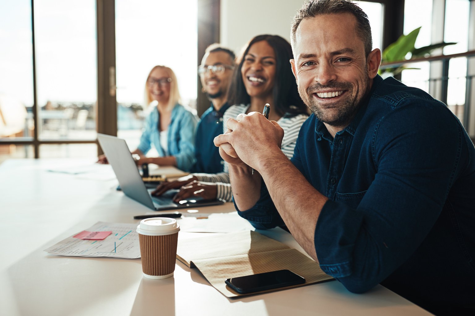 Smiling Team in a Workplace 