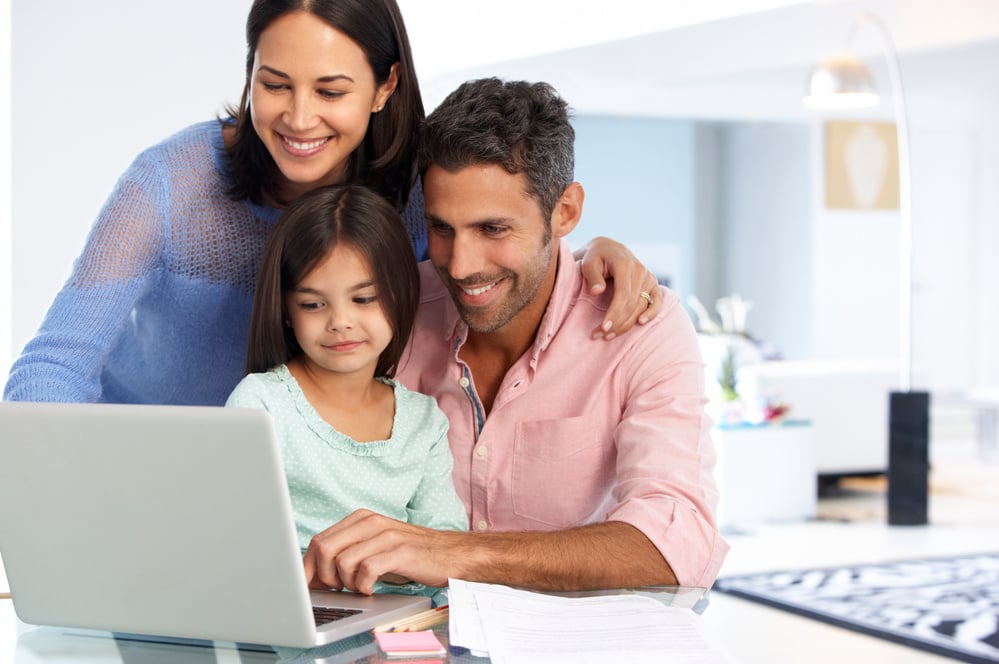 Family Working at Laptop 