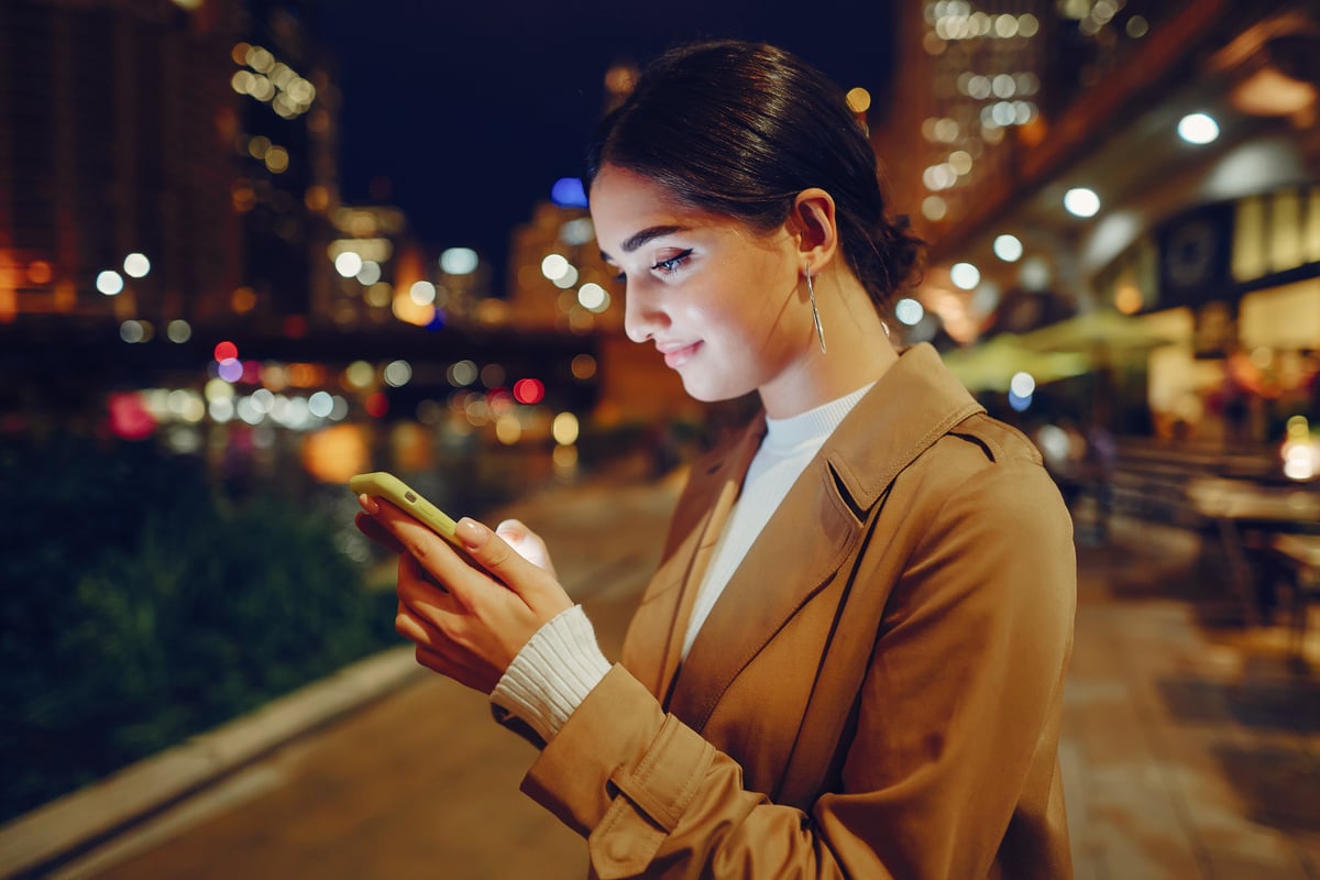 Girl at Night with Phone