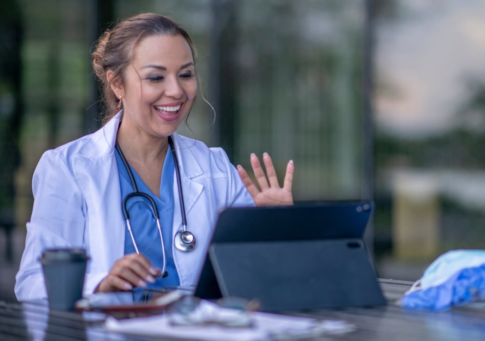 Hispanic doctor telemedicine